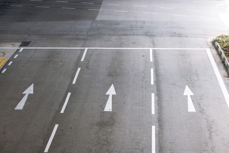 Asphalt road and white line markings Asphalt road texture