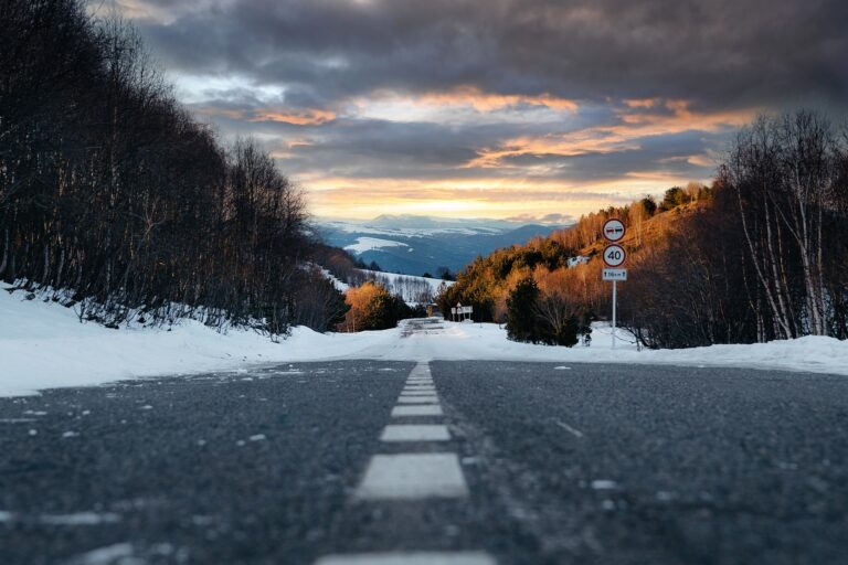 Empty asphalt road in winter.