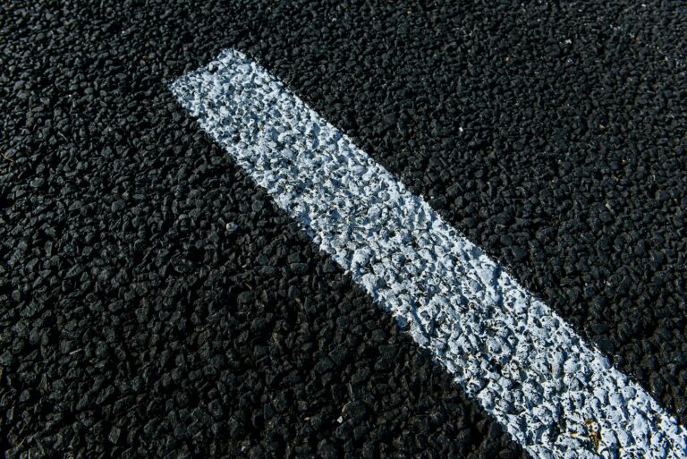 New asphalt texture with white dashed line