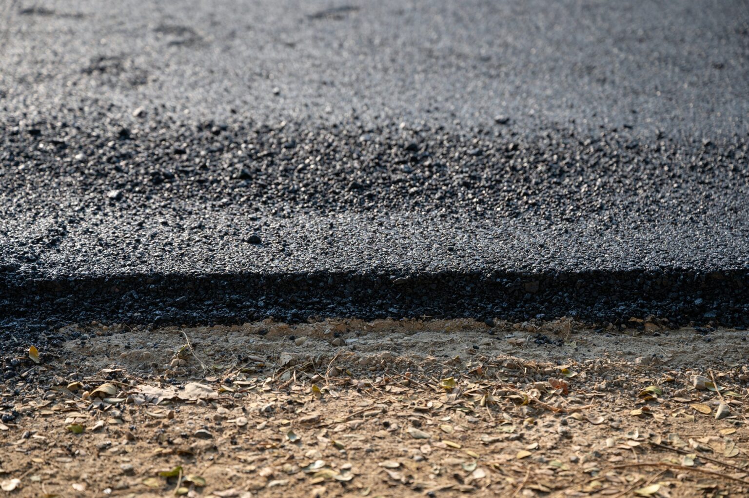 New asphalt tarmac texture road of repairing on the damaged highway