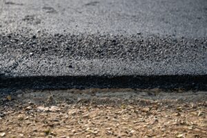 New asphalt tarmac texture road of repairing on the damaged highway